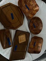 Group view of six wooden serving pieces