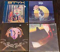 All four Styx album covers displayed together