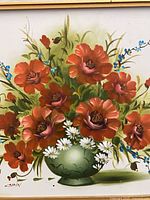 Close view of floral painting showing signature and brushwork