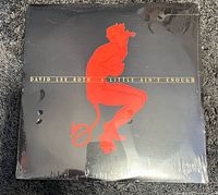 Front of sealed LP showing artwork and shrink wrap