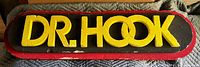front of Styrofoam sign showing raised yellow DR. HOOK letters, color scheme and wear
