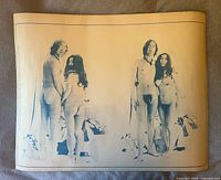 Front of poster showing blue monochrome images of John Lennon and Yoko Ono