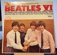 Front cover under shrink showing title, stickers, and shrink integrity