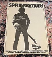 Front of ‘The Bottom Line’ poster showing silhouette of Springsteen with guitar and shoes