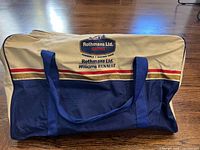 Full side view showing Rothmans Ltd. Racing Team logo and color scheme