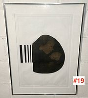 Full view of framed artwork showing mother and child image