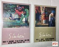 Both Simbari posters side by side in frames