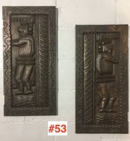 Both carved doors side by side showing size and relief detail