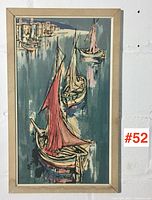 Full view of framed sailboat painting