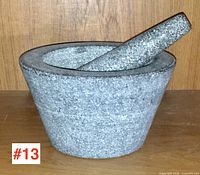 mortar with pestle resting inside
