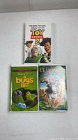 Front view of all three VHS cases: Toy Story 2, A Bug’s Life, The Road to El Dorado