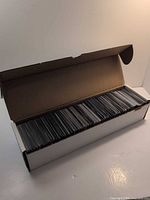 Open 800-count box showing row of Magic cards