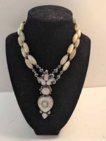 Full view of necklace on display bust