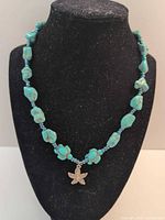 Full view of necklace on display bust