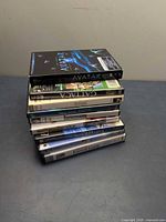 Stacked view of all nine DVD cases