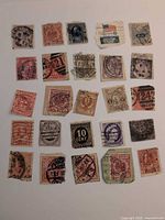 Overall view of 25 assorted cancelled stamps