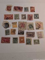 Full group of 25 stamps on white background