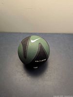 Front view showing Nike logo and weight marking