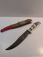 Full view of dagger and sheath