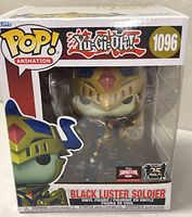Front view of boxed Black Luster Soldier Funko Pop! #1096 showing Target Con and 25th Anniversary stickers