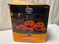 Front of original box showing Hyde & EEK! inflatable pumpkin patch