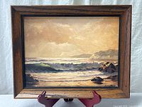 Front view of framed painting showing composition and frame