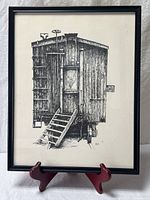 Full view of framed ink drawing