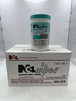 Overall view showing one NCL disinfectant wipes canister on top of shipping carton