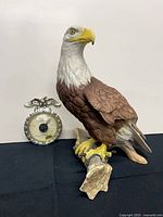 Full view of eagle figurine and thermometer