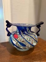 Front view showing color swirls, handles and form