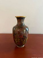 Full view of vase front showing floral cloisonné design