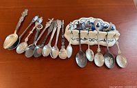 overall view showing all 12 spoons and ceramic rack
