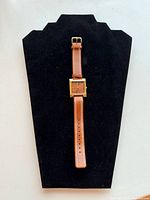 Full view of wristwatch on display pad