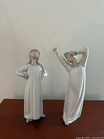 Front view of both Lladró figurines