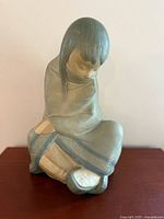 Full view of Lladro Indigenous girl figurine front