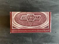 Top of maroon box with Chevrolet emblem and product description