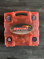 Closed red Beyblade Metal Masters carry case top view