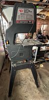 Full view of Craftsman 10" band saw on stand