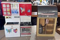 Overall view of kitchen unit and BBQ grill side by side