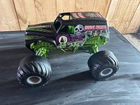 Left front angle view of Grave Digger toy truck