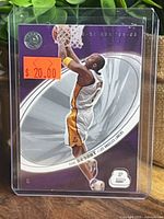 Front of Kobe Bryant Fleer E-XL card in sleeve