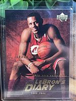 Front of LeBron James Upper Deck LeBron’s Diary rookie card LJ11 in sleeve