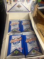 Box holding four sealed 1991 Upper Deck Baseball packs