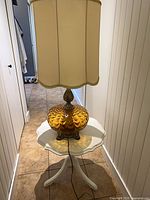 Lamp on table showing overall size and style