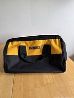 Front view showing DeWalt logo, handles, color scheme