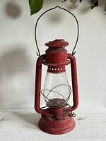 Full view of red Beacon oil lantern