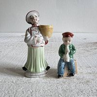 Front view of both figurines