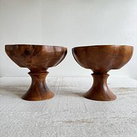 Front view of both wooden pedestal bowls