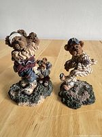 Front view of both sport bear figurines