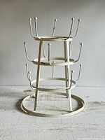 Front view of metal three-tier mug tree stand